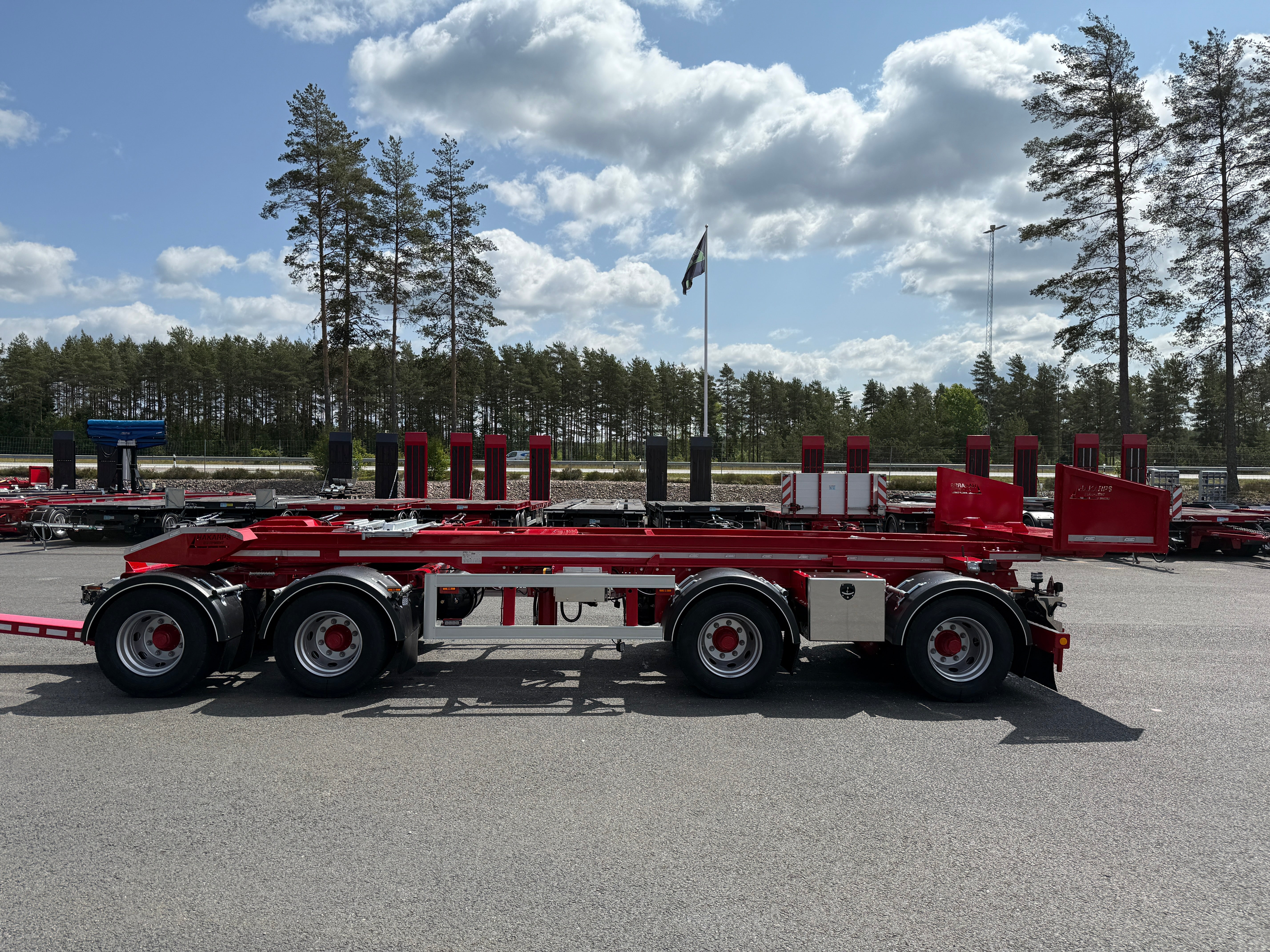 38 tons lastväxlarvagn med tipp, skjutbar boggie och flak